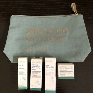 New Biossance makeup bag with travel sized products, NIB
